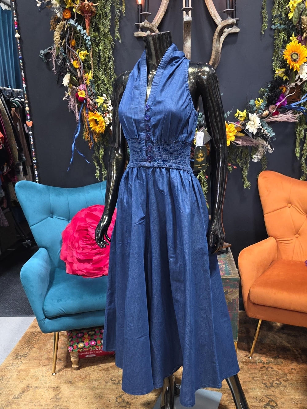 Sleeveless Blue Halter Jumpsuit with Smocked Waist & Flare legs